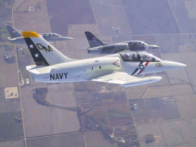 L-39 formation cavorts over Illinois farm fields.